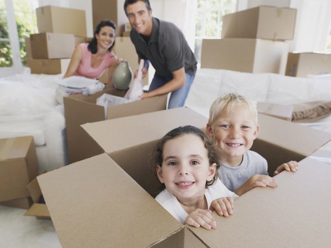 Packed boxes and furniture ready for local removals
