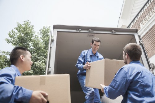 Removal team planning a home move in Hainault
