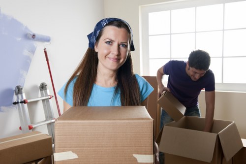 House movers helping a family move home in Hainault